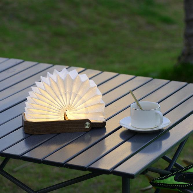 Artistic Glow: Wooden Hand Lamp for Bedside Tables